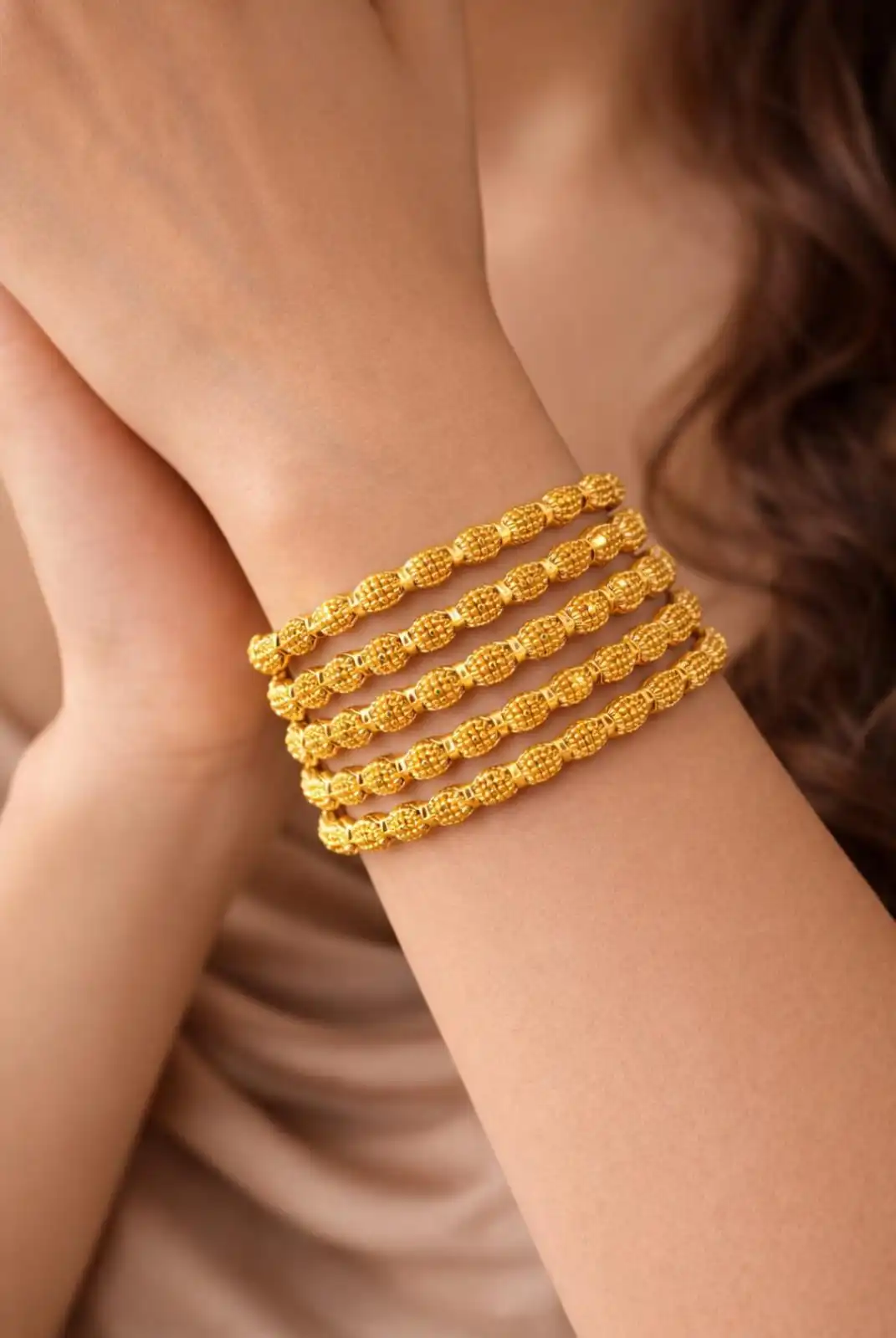 Golden Oval Textured Bangle Set